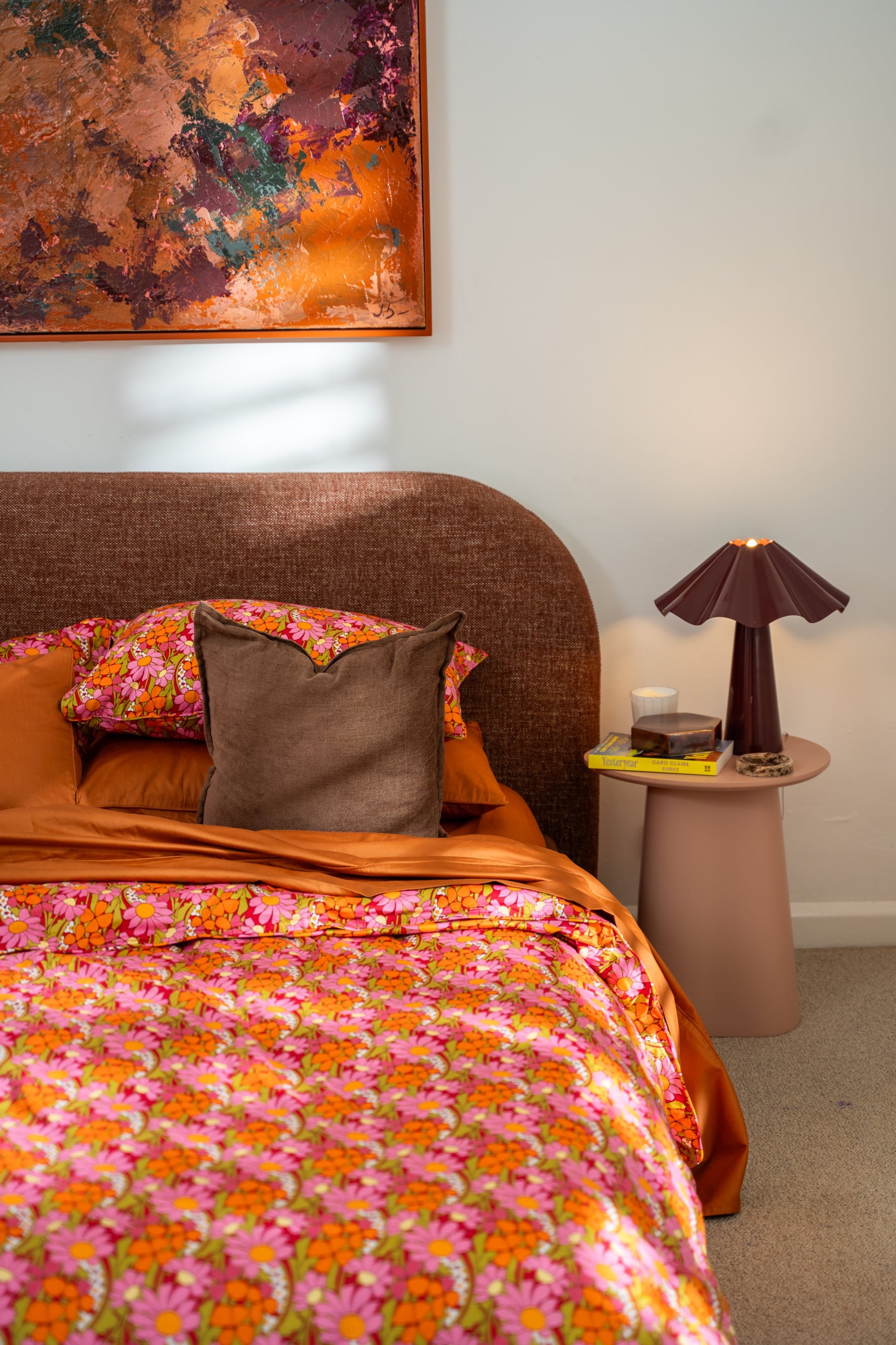 Petal floral bedding layered with Butterscotch sheets and pillowcases