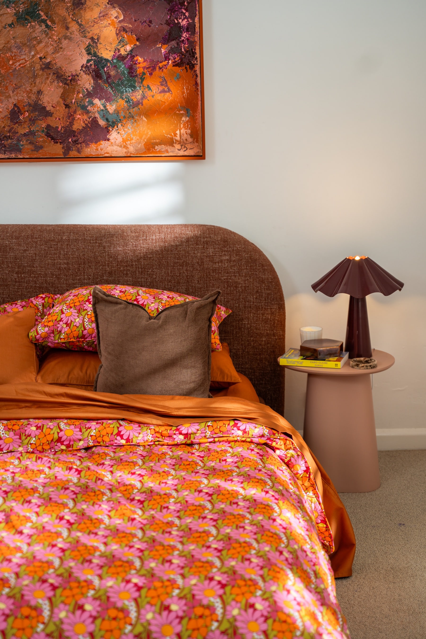 Petal floral bedding layered with Butterscotch sheets and pillowcases
