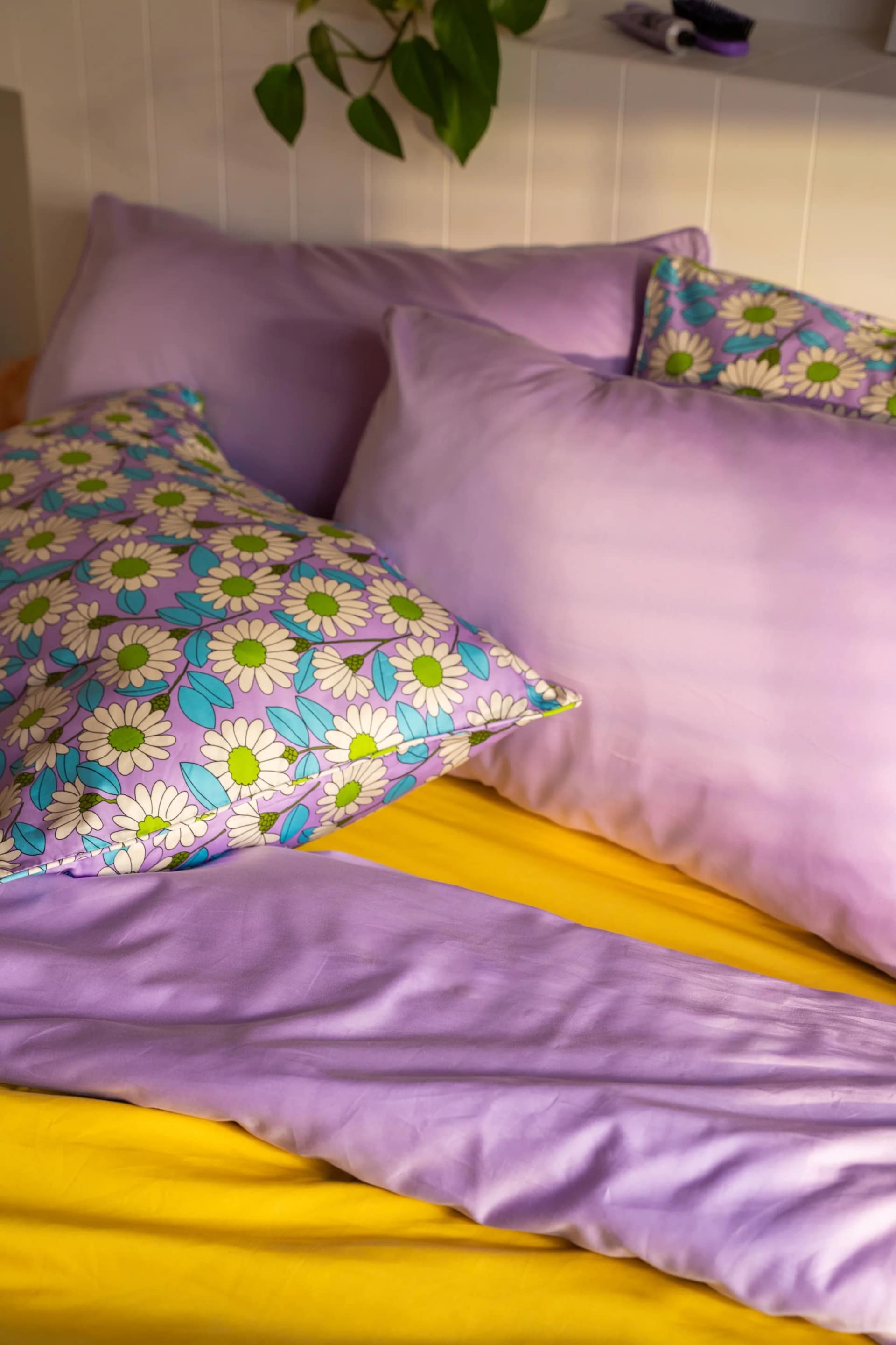 Lilac cotton quilt cover styled in warm afternoon light alternate view